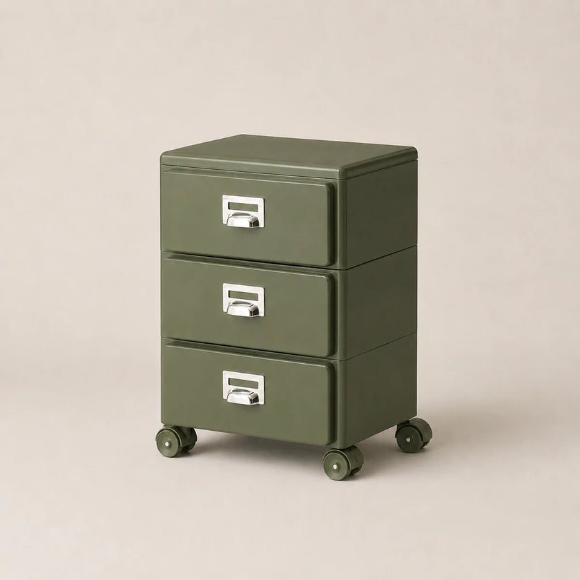 Green three-drawer filing cabinet on wheels with silver handles against a beige background