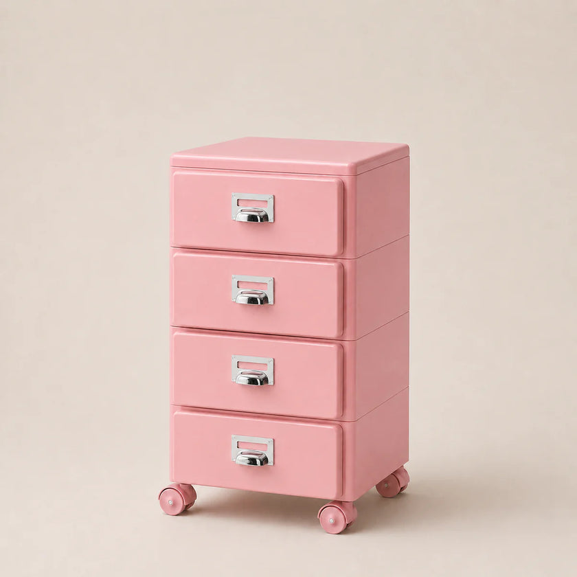 Pink three-drawer filing cabinet on wheels with silver handles against a beige background