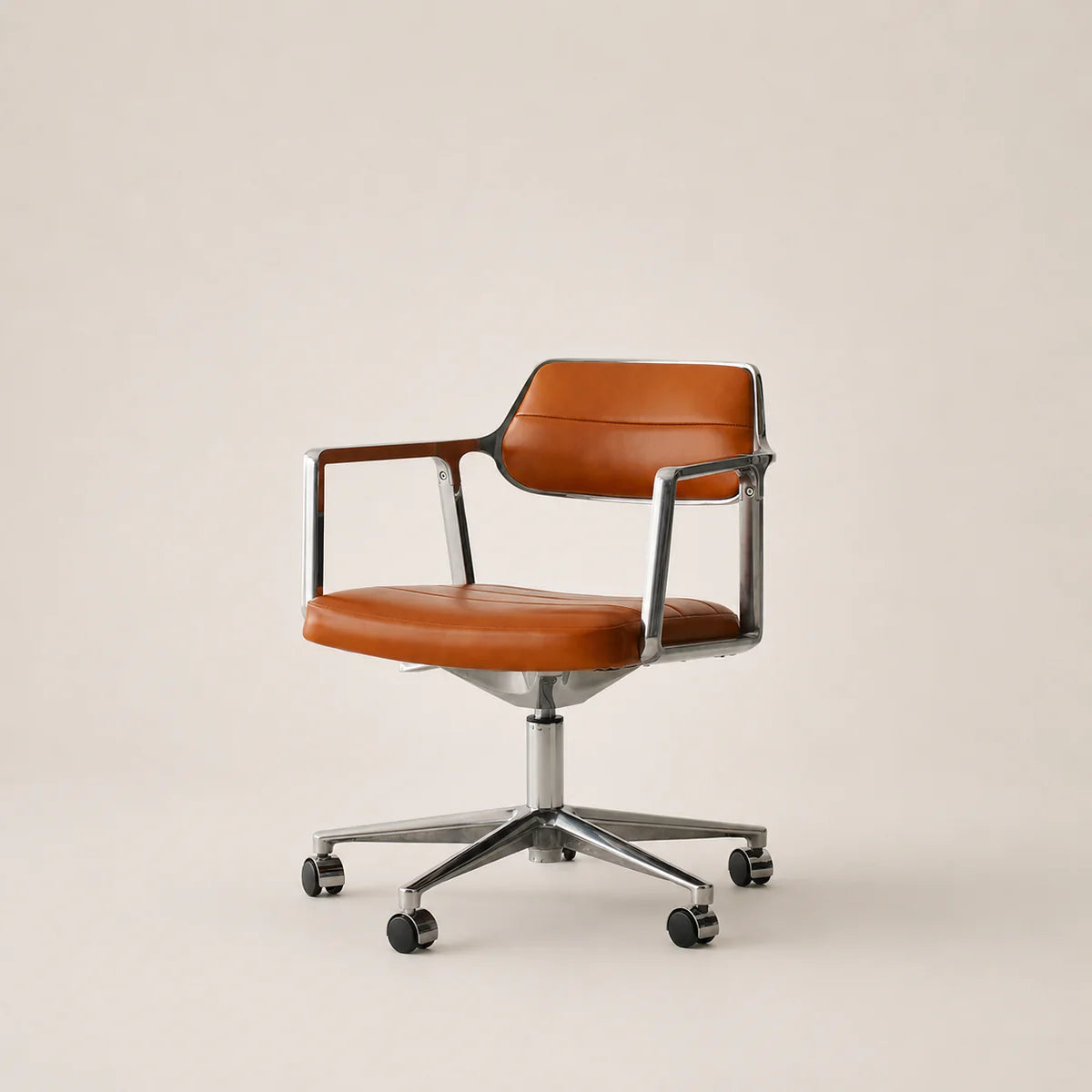 Brown office chair with metal frame on a beige background