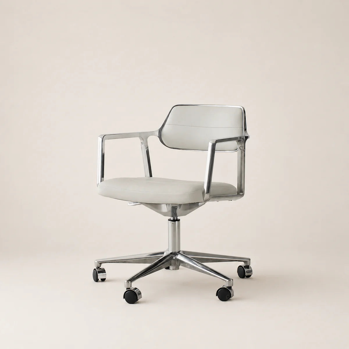 Modern office chair with a white seat and gray backrest on a beige background