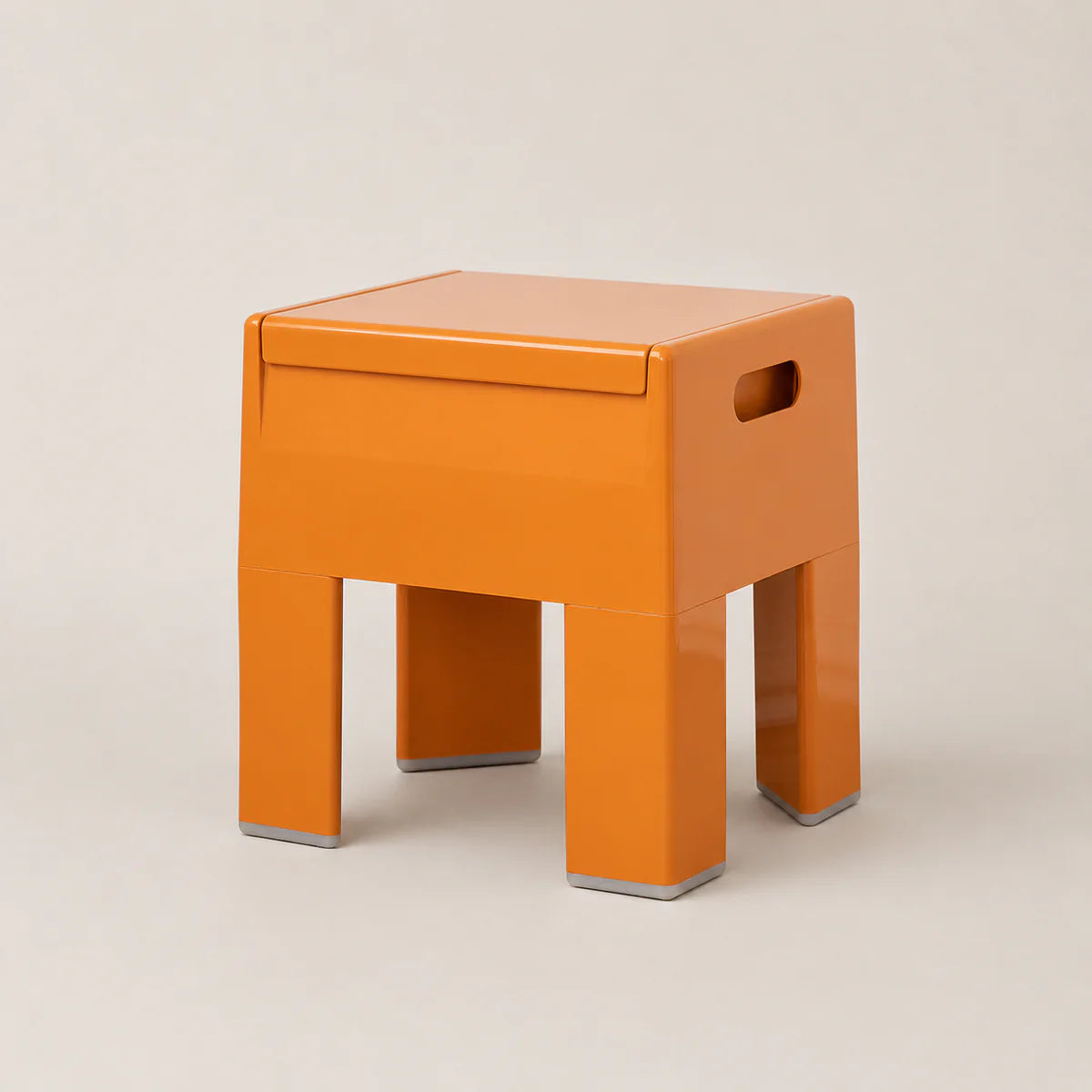 Orange stool on a beige background
