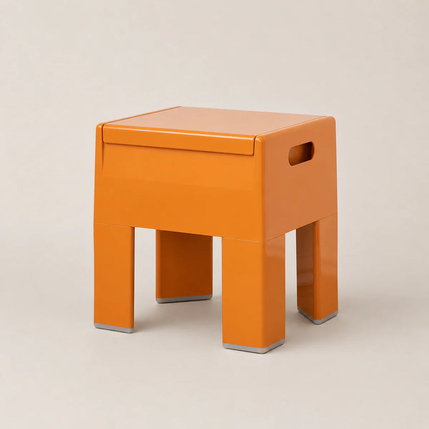 Orange stool on a beige background