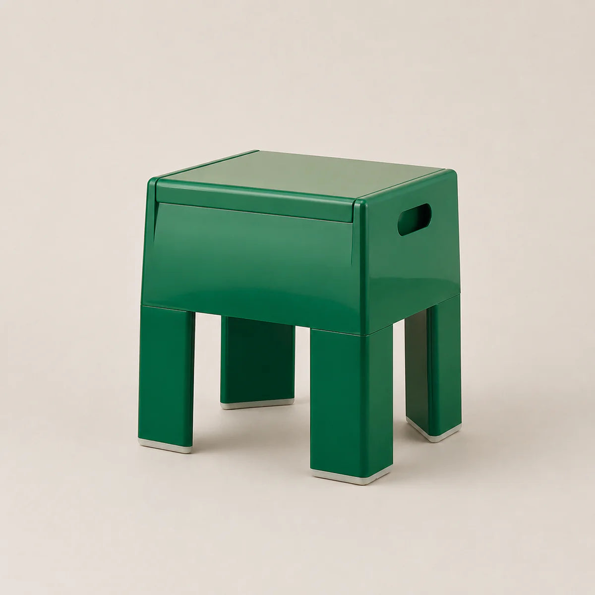 Green stool on a beige background