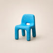 Blue textured chair on a beige background