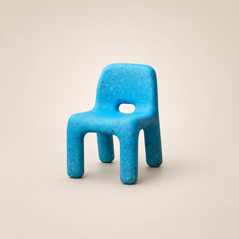 Blue textured chair on a beige background