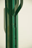 Green coat rack stand metal frame against a white background