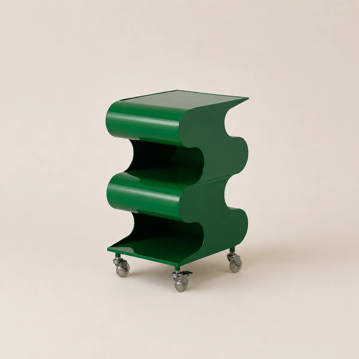Green wavy side table on wheels against a beige background