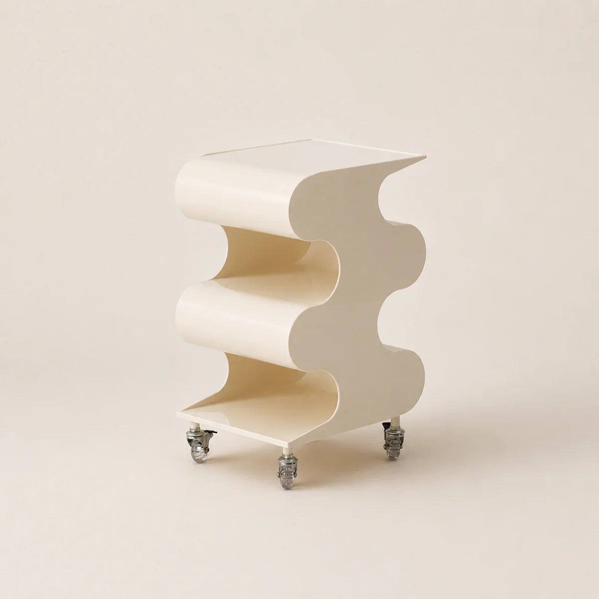 Modern white side table with wavy design on a beige background