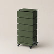 A dark green rolling storage cabinet with five stacked drawers and a top surface, shown on a light beige background.