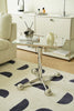 Modern side tables living room with glass top and chrome legs in a living room setting.