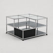A modular two-tier storage unit with a chrome metal frame, clear glass panels, and black shelves, shown on a light gray background.