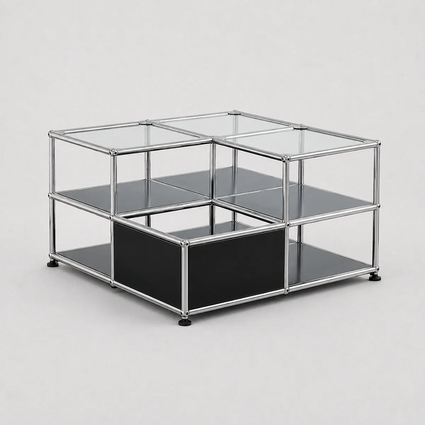 A modular two-tier storage unit with a chrome metal frame, clear glass panels, and black shelves, shown on a light gray background.