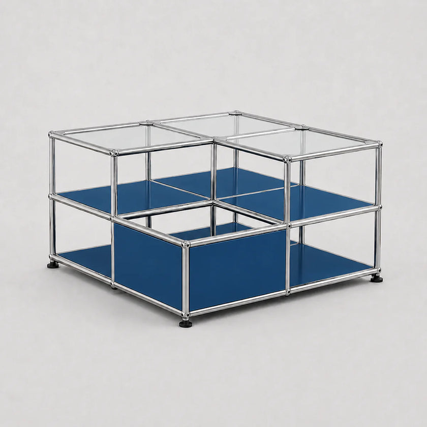 A modular two-tier storage organizer with a chrome metal frame, clear glass top panels, and blue fabric shelves, shown on a light gray background.