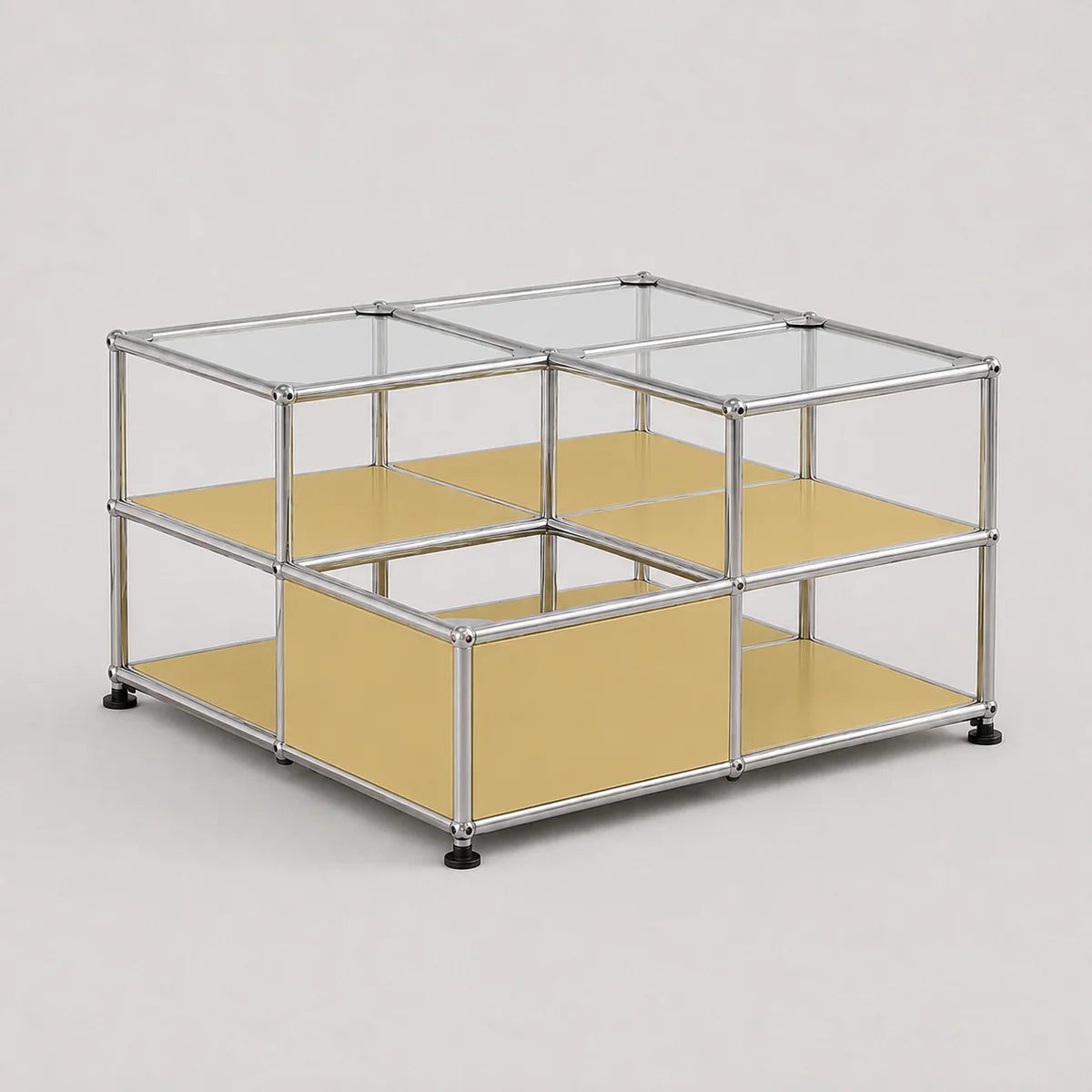 A modular two-tier storage shelf unit with a silver aluminum frame, clear glass top panels, and mustard yellow shelves, shown on a light gray background.