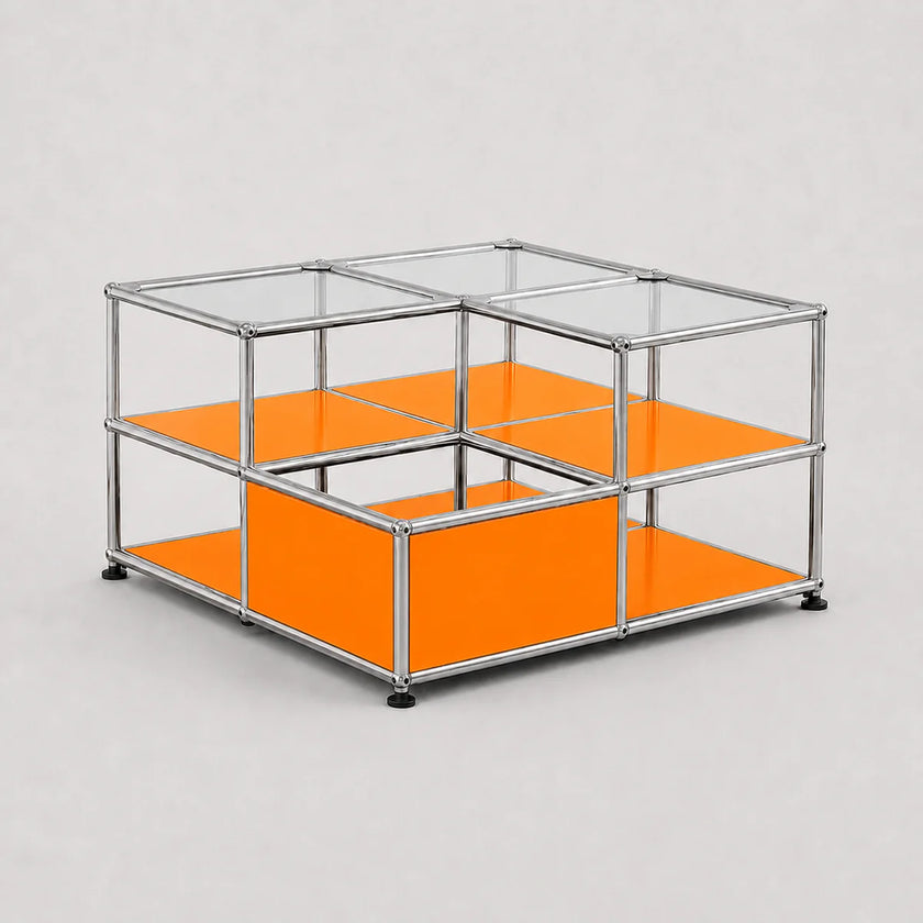 A modular two-tier storage unit with a chrome metal frame, clear glass panels, and bright orange shelves, shown on a light gray background.