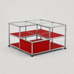 A modular storage organizer with a chrome metal frame, clear glass panels on the top, and bright red shelves on the bottom, shown on a light gray background.