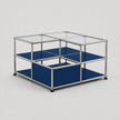 A modular two-tier storage organizer with a chrome metal frame, clear glass top panels, and solid blue fabric shelves, shown on a light gray background.
