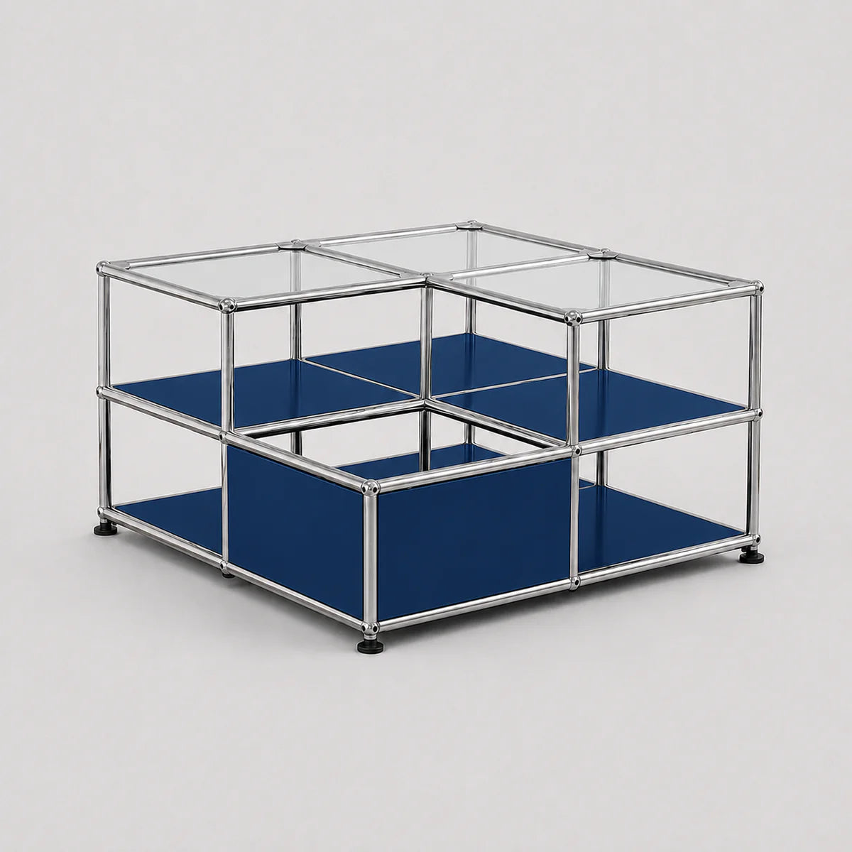A modular two-tier storage organizer with a chrome metal frame, clear glass top panels, and solid blue fabric shelves, shown on a light gray background.