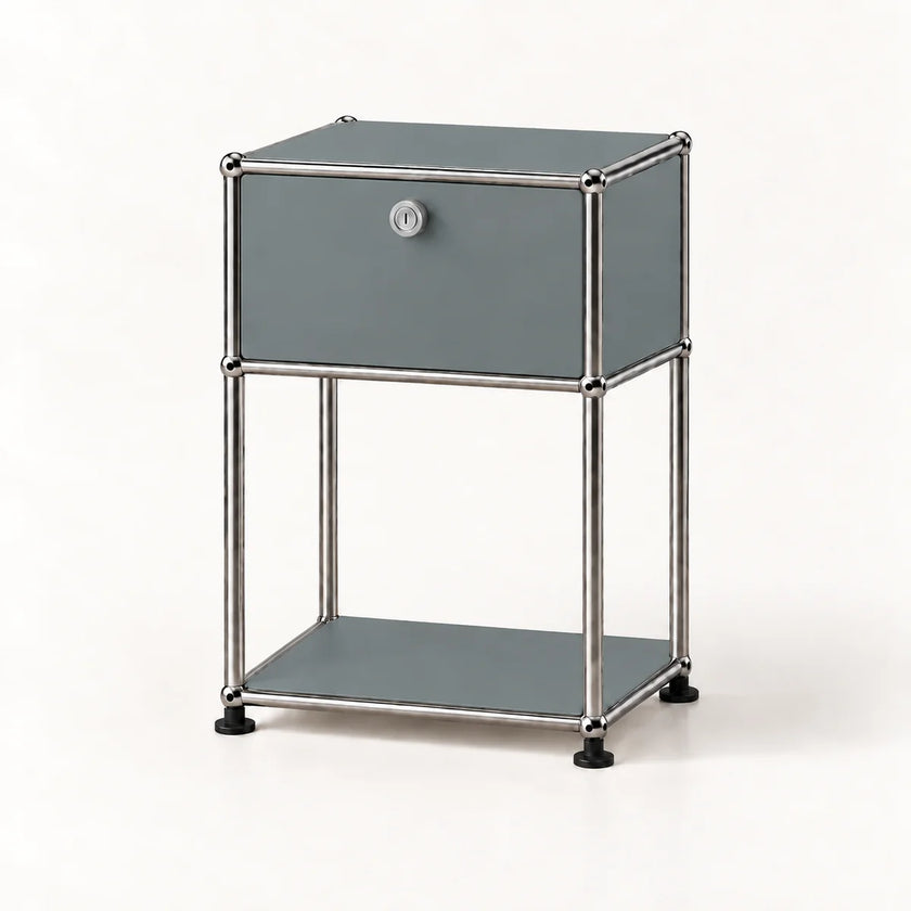A modern two-tier storage cabinet with a gray panel front and a silver metal frame, featuring a single lockable drawer on the top shelf and a lower open shelf, set against a plain white background.