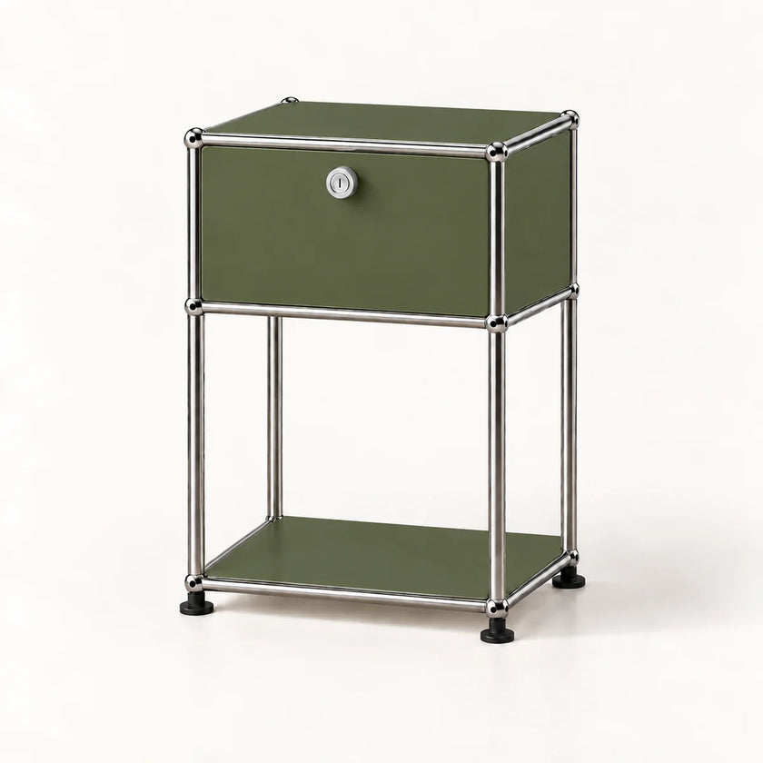 An olive green modular storage cabinet with a silver metal frame, featuring a top drawer with a round silver knob and a lower open shelf, set against a plain white background.