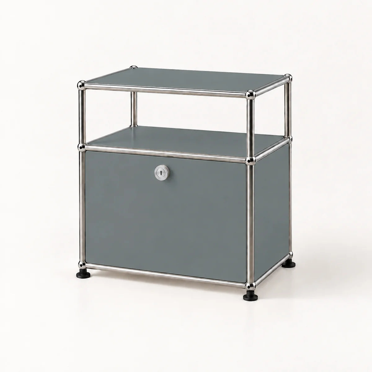 A modern two-tier storage cabinet with a gray faux-leather finish and a chrome tubular metal frame, featuring a single lockable door with a silver keyhole and black rubber feet.