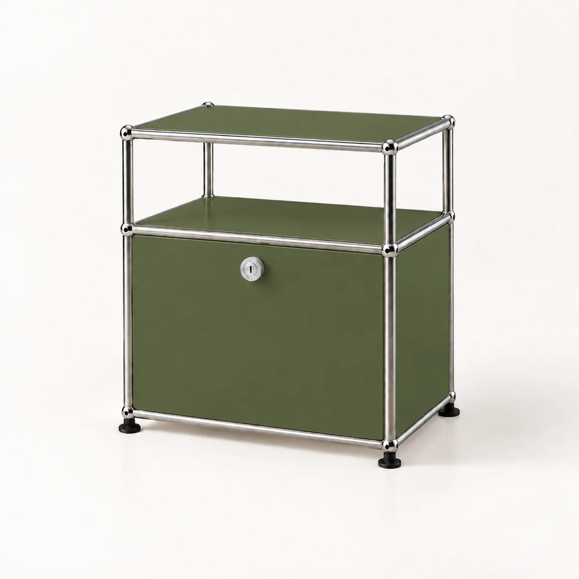 An olive green modular storage cabinet with a chrome metal frame and black feet, featuring two open shelves on top and a single lockable door on the bottom.