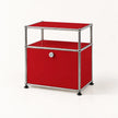 A modern two-tier side cabinet with a vibrant red metal-covered frame and a polished chrome metal structure, featuring a single lockable drawer on the bottom shelf.