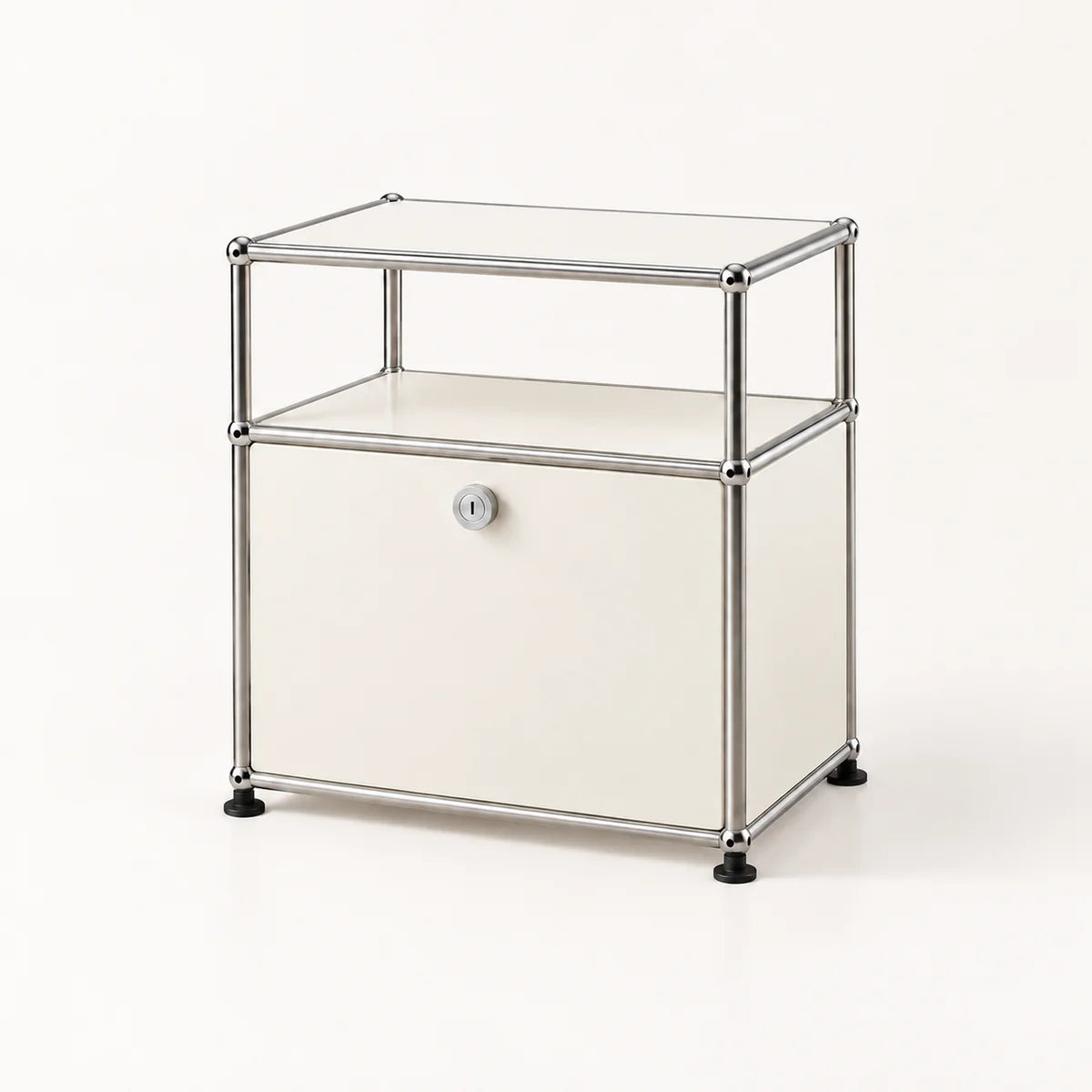 A modern modular storage cabinet with a chrome metal frame, a clear glass top shelf, a cream-colored middle shelf, and a cream lower door with a small round lock. The cabinet stands on black feet against a clean, off-white background.