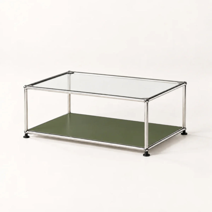 A modern two-tier coffee table with a clear glass top, a stainless metal frame, and an olive green lower shelf, shown on a plain light background.