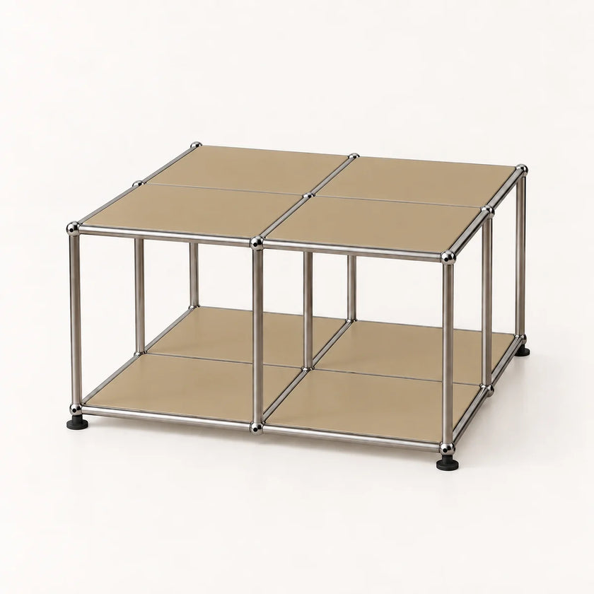 A modular metal storage cube coffee table with four beige metal panels on a chrome metal frame, shown on a clean white background.
