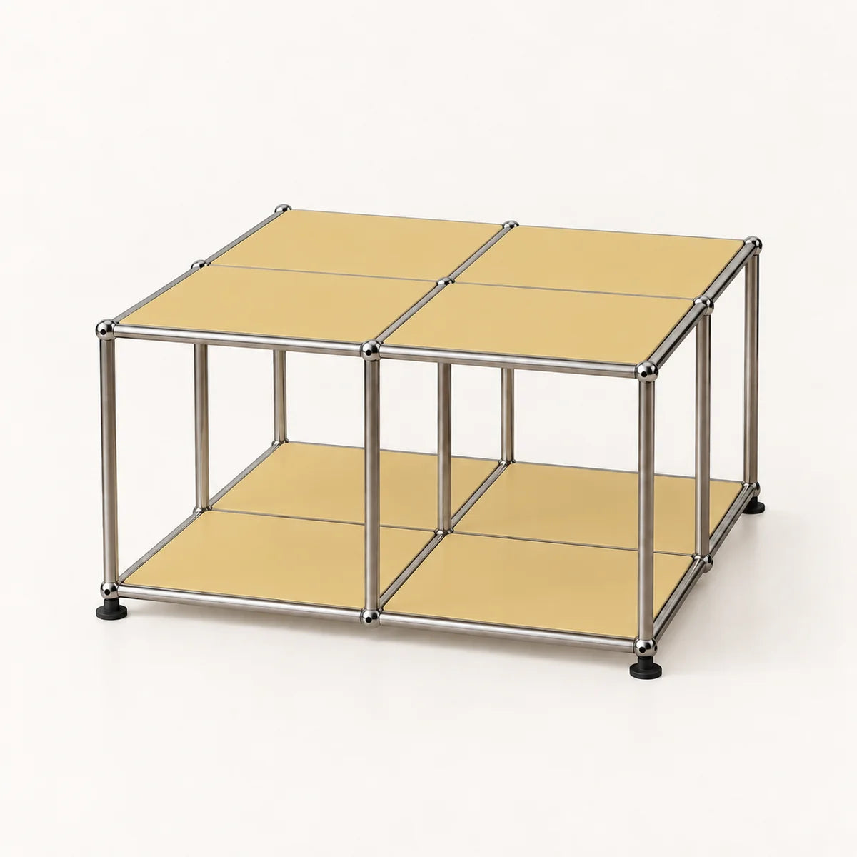 A modular metal storage cube with four beige panels on top and a lower shelf, supported by a stainless chrome frame with black feet, shown on a white background.