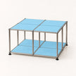 A modular storage cube organizer with a stainless metal frame and light blue panels on a clean white background.