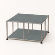 A modular two-tier storage cube organizer with a stainless metal frame and dark gray panels, shown on a clean white background.