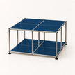 A modular metal storage cube with blue panels and a chrome stainless frame, shown on a clean white background.