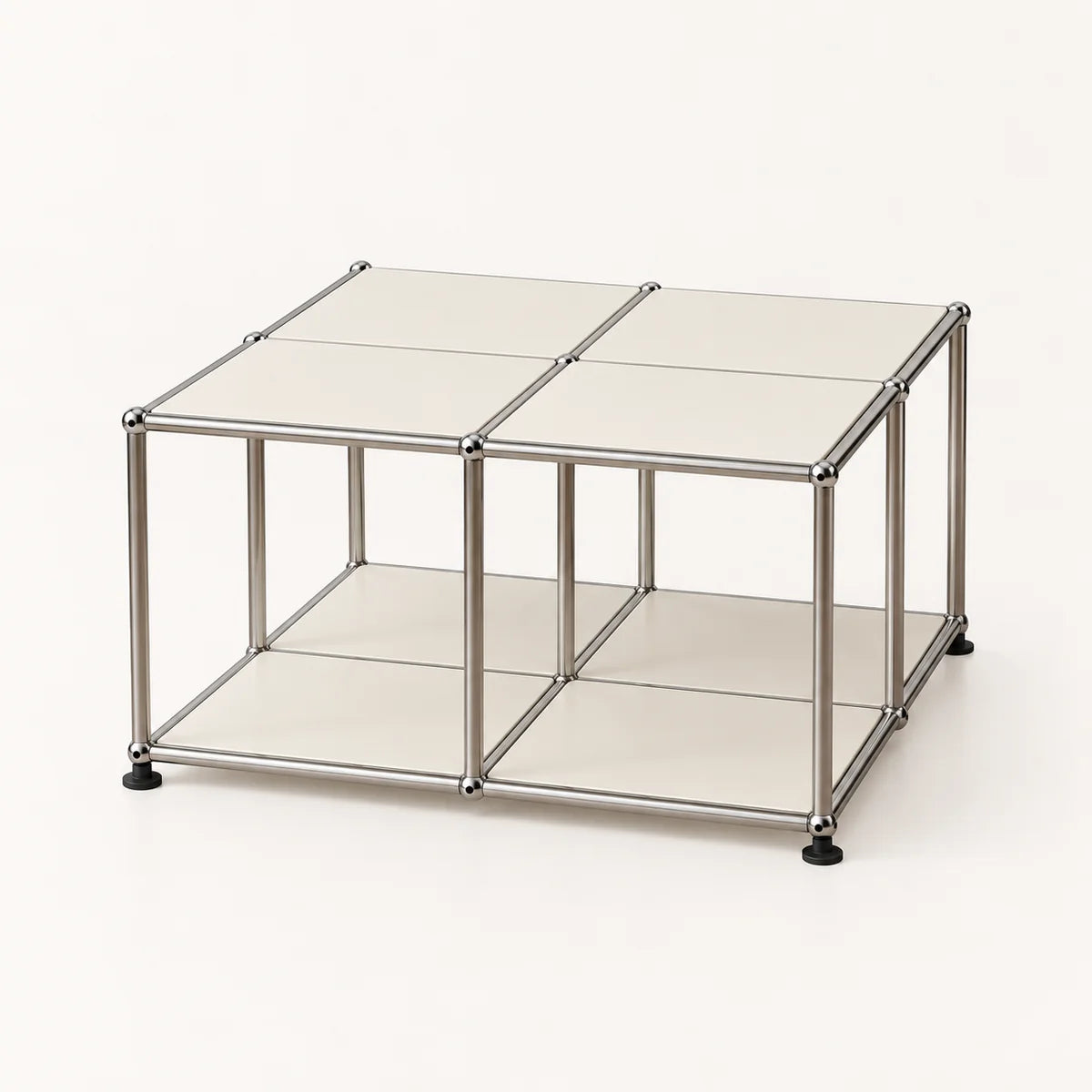 A modular metal cube storage organizer with four square panels on top, open shelves, and black feet, shown on a clean off-white background.