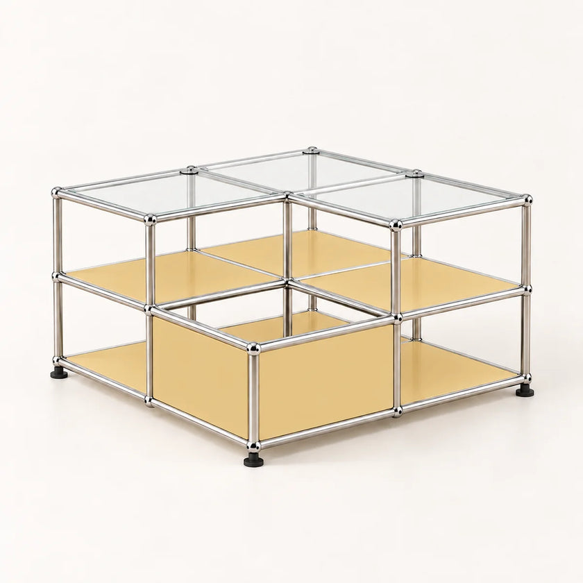 A modular metal cube storage organizer with clear glass top panels, light yellow shelves, and black feet, shown on a clean off-white background.