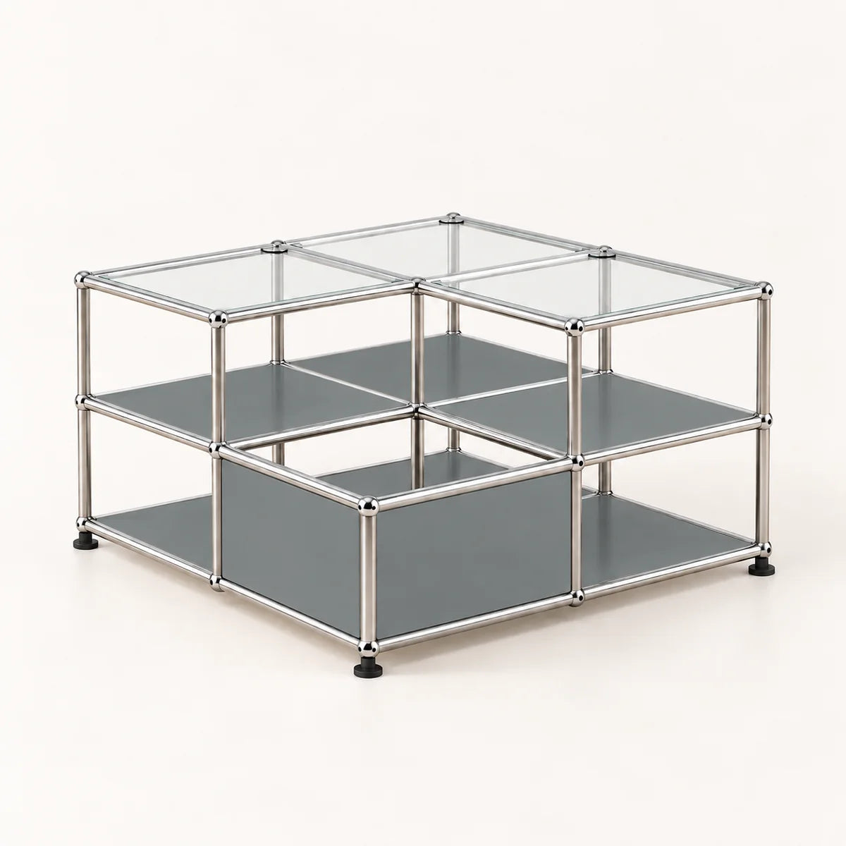 A modular 2-shelf storage organizer with a chrome-finished metal frame, clear glass top panels, and gray shelves, shown on a light beige background.