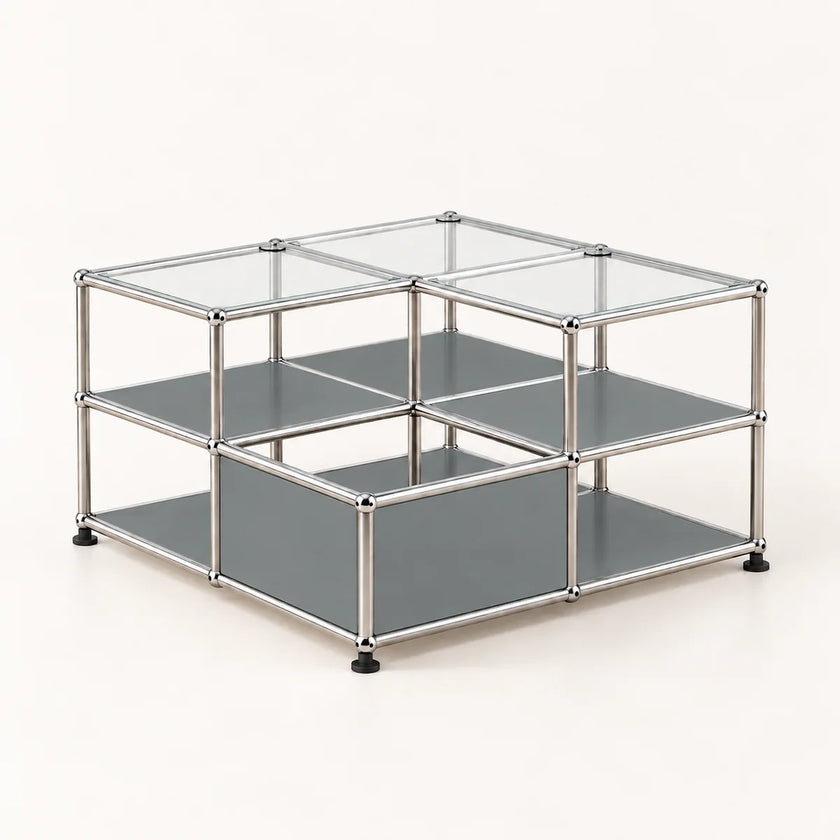 A modular 2-shelf storage organizer with a chrome-finished metal frame, clear glass top panels, and gray shelves, shown on a light beige background.