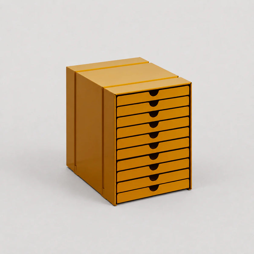 Yellow metal file cabinet with multiple drawers on a white background