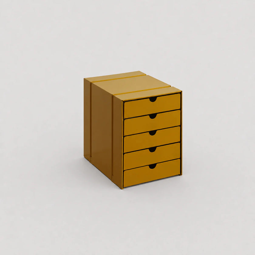 Yellow metal file cabinet with four drawers on a light gray background