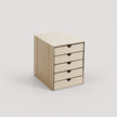 Beige cardboard storage box with four drawers on a light gray background