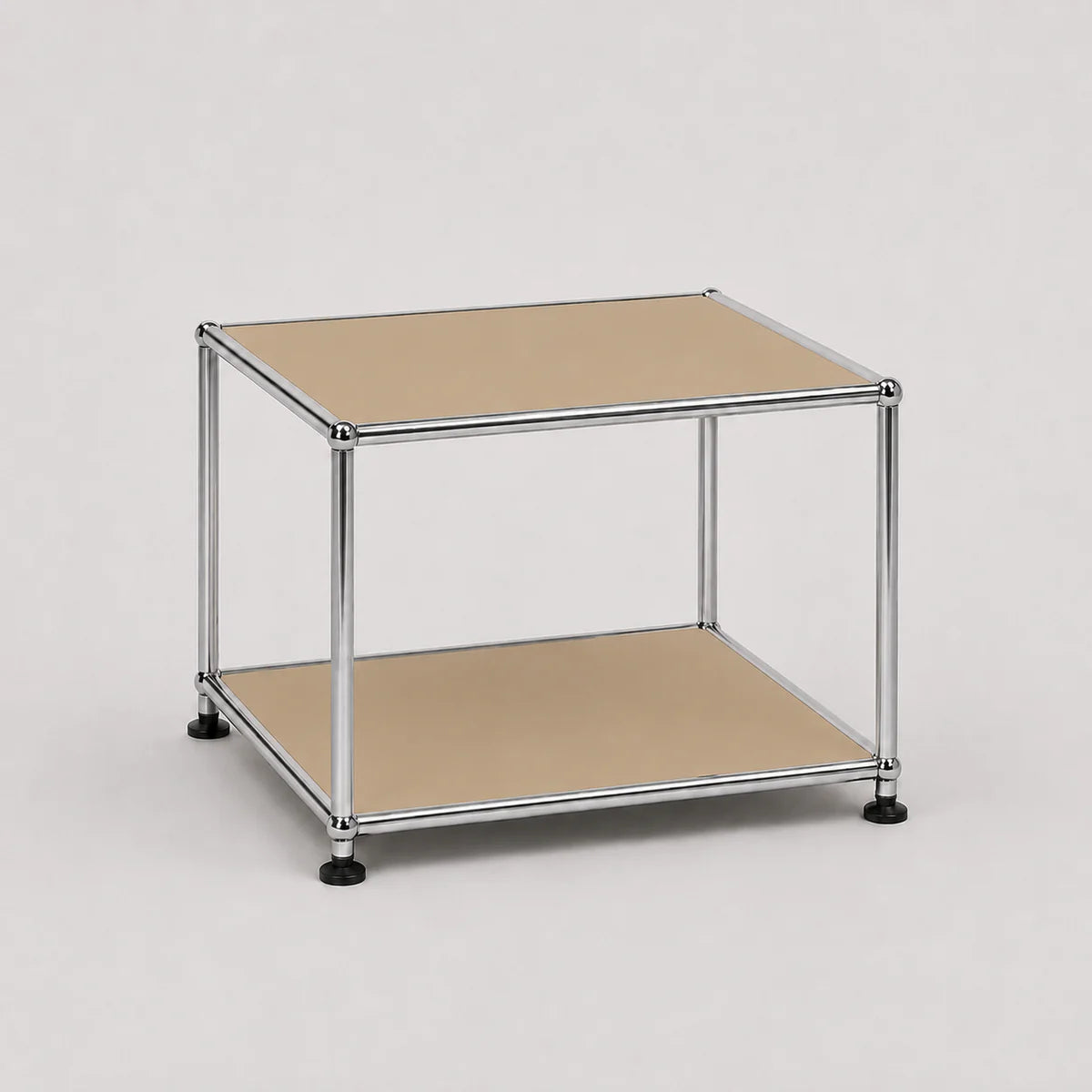 A two-tier modular storage shelf with a chrome metal frame, beige metal-covered shelves, and black caster feet, shown on a light gray background.