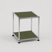 Modular shelving unit with olive green shelves and metal frame on a white background
