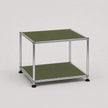 A two-tier modular storage table with olive green metal shelves and a chrome metal frame, shown on a light gray background.