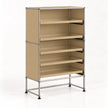 A modular metal shelving unit with beige metal panels and five open shelves, supported by a chrome-finished metal frame with black feet, shown on a white studio background.
