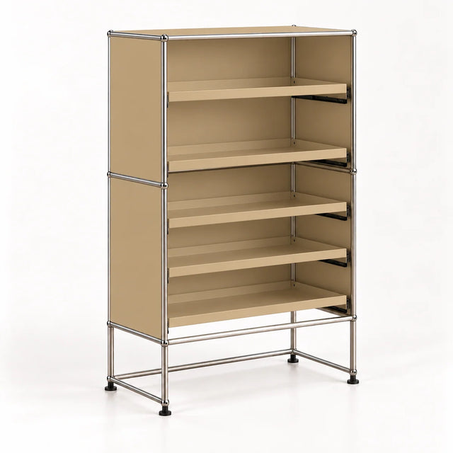 A modular metal shelving unit with beige metal panels and five open shelves, supported by a chrome-finished metal frame with black feet, shown on a white studio background.