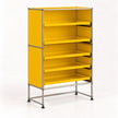 A modern modular shelving unit with bright yellow panels and a chrome metal frame, shown on a clean white background.