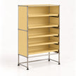 A modular metal shelving unit with a warm beige/yellow panel design and a chrome steel frame, shown on a clean white background.