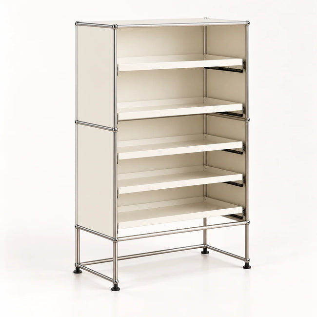 A modular metal storage cabinet with five open shelves, featuring a silver chrome frame, cream-colored panels, and black rubber feet, shown on a white studio background.