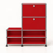 A red modular storage cabinet with a chrome metal frame and black feet, featuring two upper doors with silver knobs and four open lower shelves, shown on a white background.